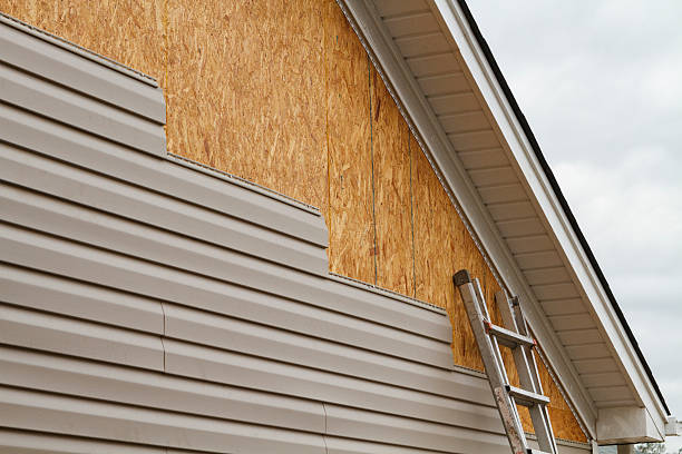 Professional Siding Replacement technician working in Southborough, MA